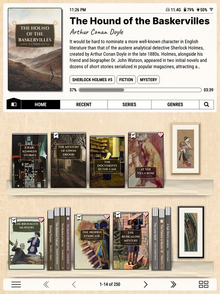 Prints on the wall above a spine shelf.